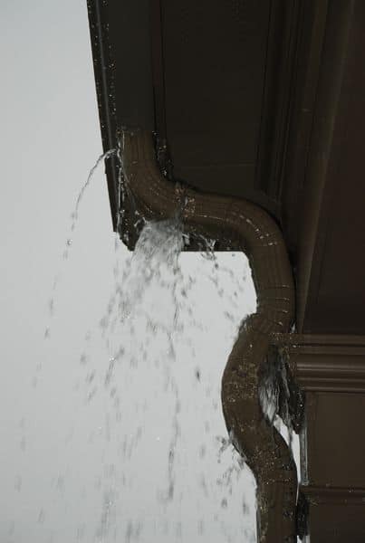 water leaking from downspout